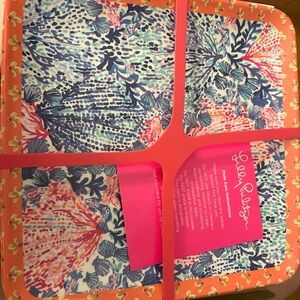 Brand new Lilly Pulitzer plates. Four plates. Melamine. In original packaging.